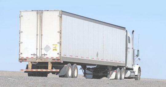 white tractor-trailer